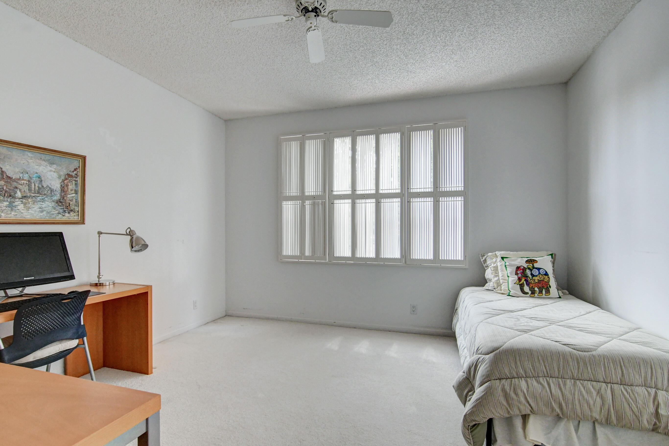 5771 Coach House Circle, Unit G Boca Raton, FL 33486 - Photo 31 of 72 Guest Bedroom Plantation Shutters