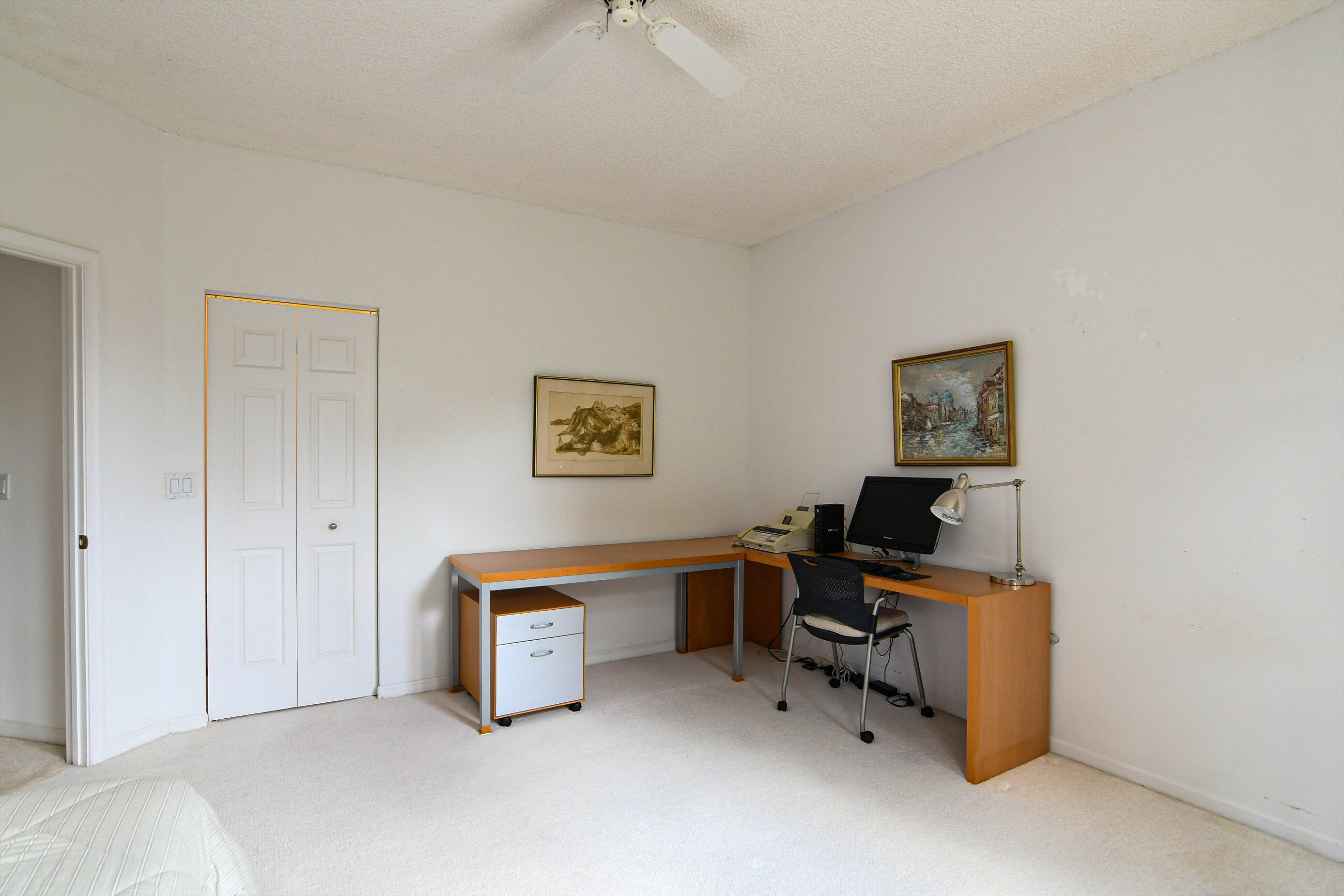 5771 Coach House Circle, Unit G Boca Raton, FL 33486 - Photo 32 of 72 Guest Walk-In Closet