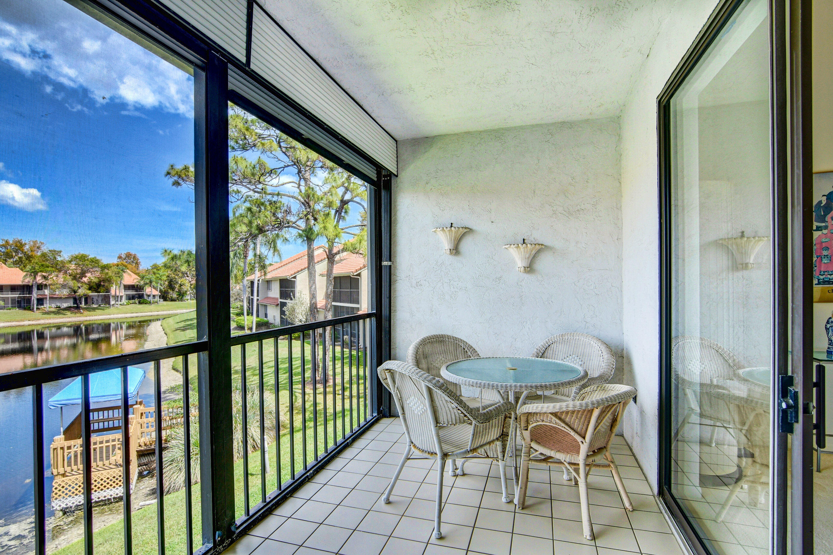 5771 Coach House Circle, Unit G Boca Raton, FL 33486 - Photo 40 of 72 Screened & Covered Balcony
