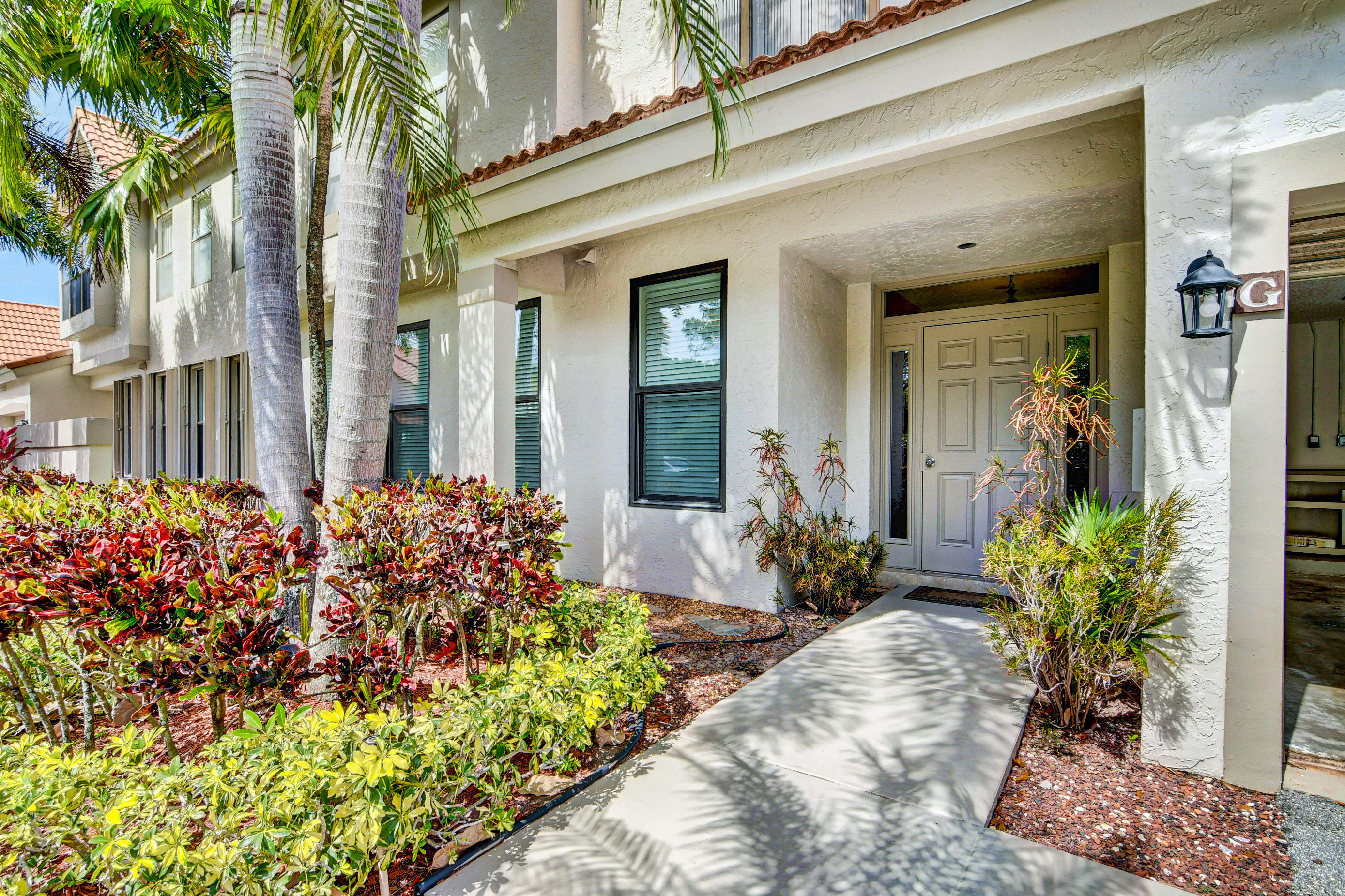 5771 Coach House Circle, Unit G Boca Raton, FL 33486 - Photo 52 of 72 Covered Building Entrance