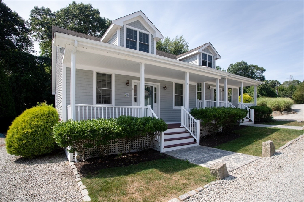 1346 Main Road, Unit B Westport, MA 02790 - Photo 2 of 29 a view of a house with garden and plants