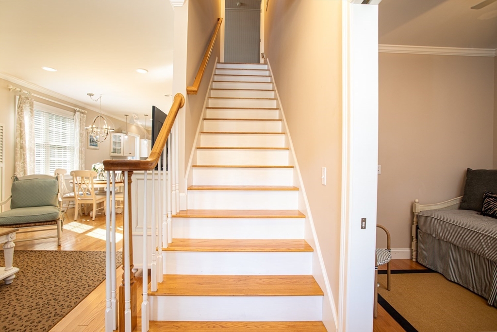 1346 Main Road, Unit B Westport, MA 02790 - Photo 23 of 29 a view of entryway and hall with wooden floor