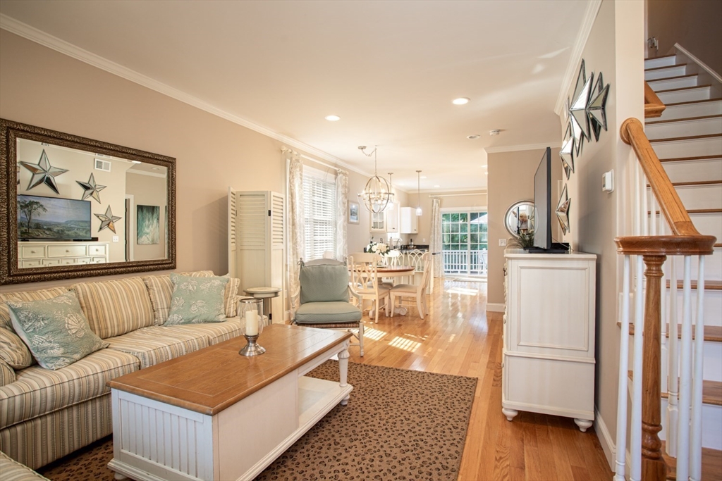 1346 Main Road, Unit B Westport, MA 02790 - Photo 6 of 29 a living room with furniture and a table
