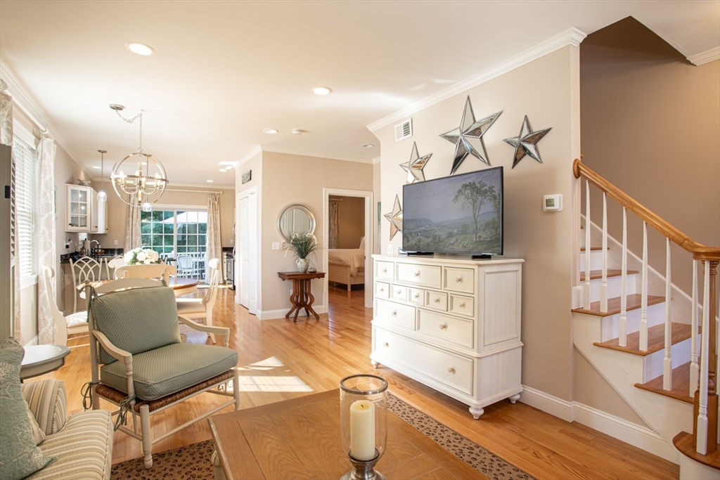 1346 Main Road, Unit B Westport, MA 02790 - Photo 7 of 29 a living room with furniture and a flat screen tv