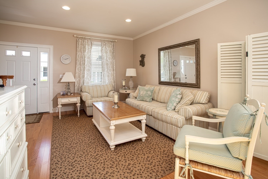1346 Main Road, Unit B Westport, MA 02790 - Photo 8 of 29 a living room with furniture and a large window