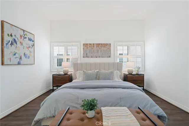 a view of a hallway view with wooden floor and staircase