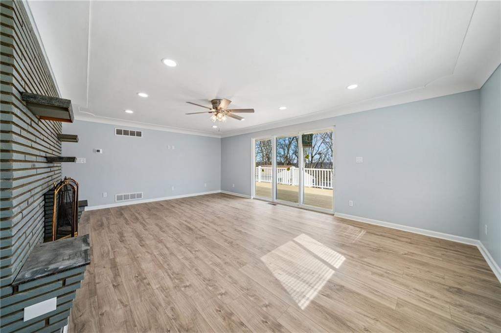 12305 Larimer Avenue Irwin, PA 15642 - Photo 12 of 39 BEAUTIFUL LIVING ROOM. ACCESS TO WRAP AROUND PORCH AND VIEWS REAR TREED YARD.