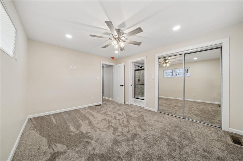 12305 Larimer Avenue Irwin, PA 15642 - Photo 14 of 39 BEDROOM 1 - (14X12) FULL BATH AND LARGE CLOSET