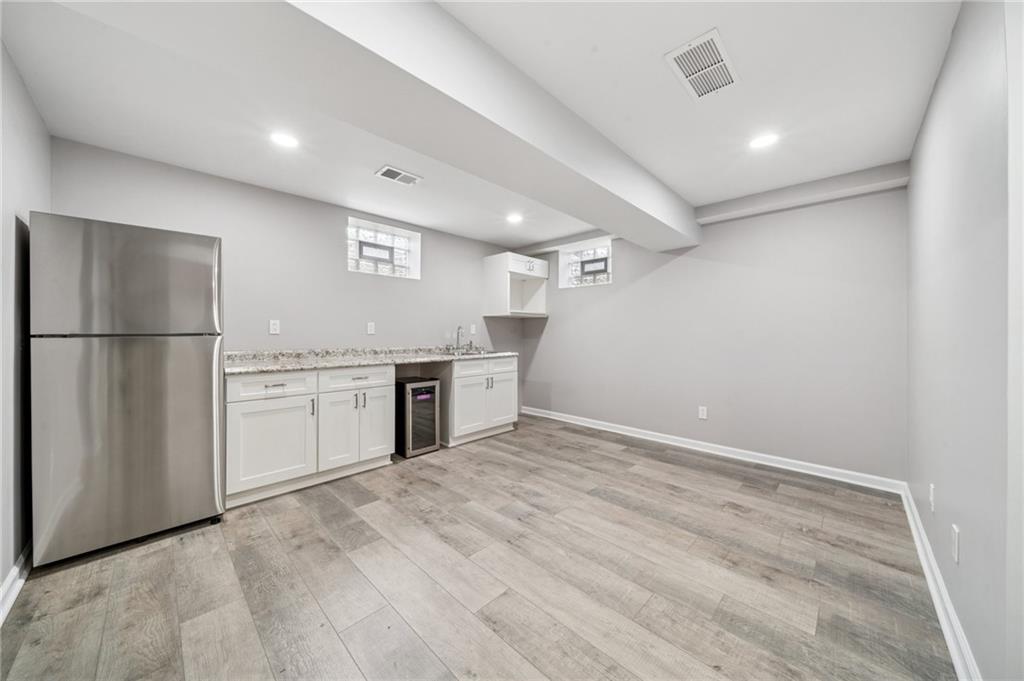 12305 Larimer Avenue Irwin, PA 15642 - Photo 24 of 39 LOWER LEVEL KITCHENETTE AREA (14X12) PERFECT FOR IN-LAW SUITE