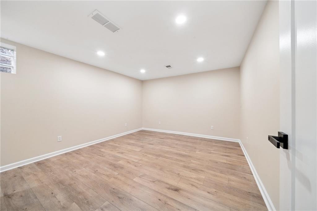 12305 Larimer Avenue Irwin, PA 15642 - Photo 26 of 39 DEN OR 5TH BEDROOM (14X12) YOU DECIDE. IF YOU NEED IN-LAW SUITE THIS IS A GREAT BEDROOM ON LOWER LEVEL