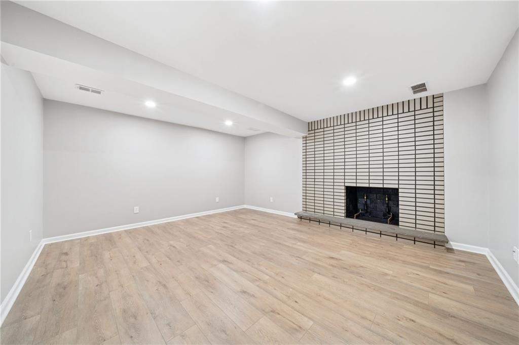12305 Larimer Avenue Irwin, PA 15642 - Photo 29 of 39 LOWER LIVING AREA. THIS COULD ALSO BE A 6TH BEDROOM IF YOU NEEDED. THE ROOM IS ~17X14
