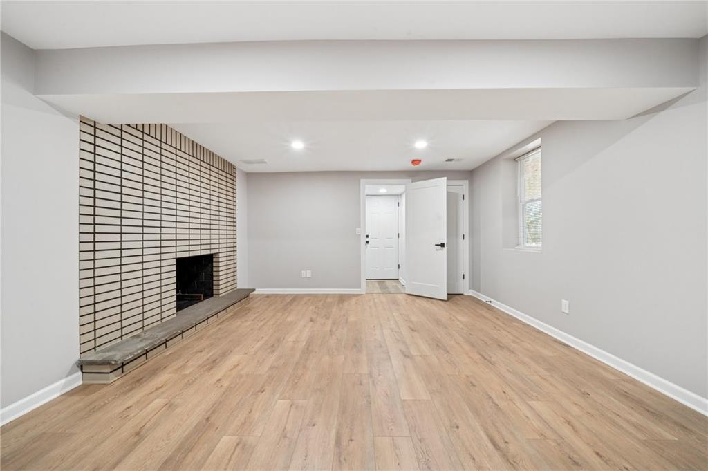 12305 Larimer Avenue Irwin, PA 15642 - Photo 30 of 39 LOWER LEVEL GAMEROOM OR IN-LAW SUITE LIVING AREA. HAS 2ND FP.