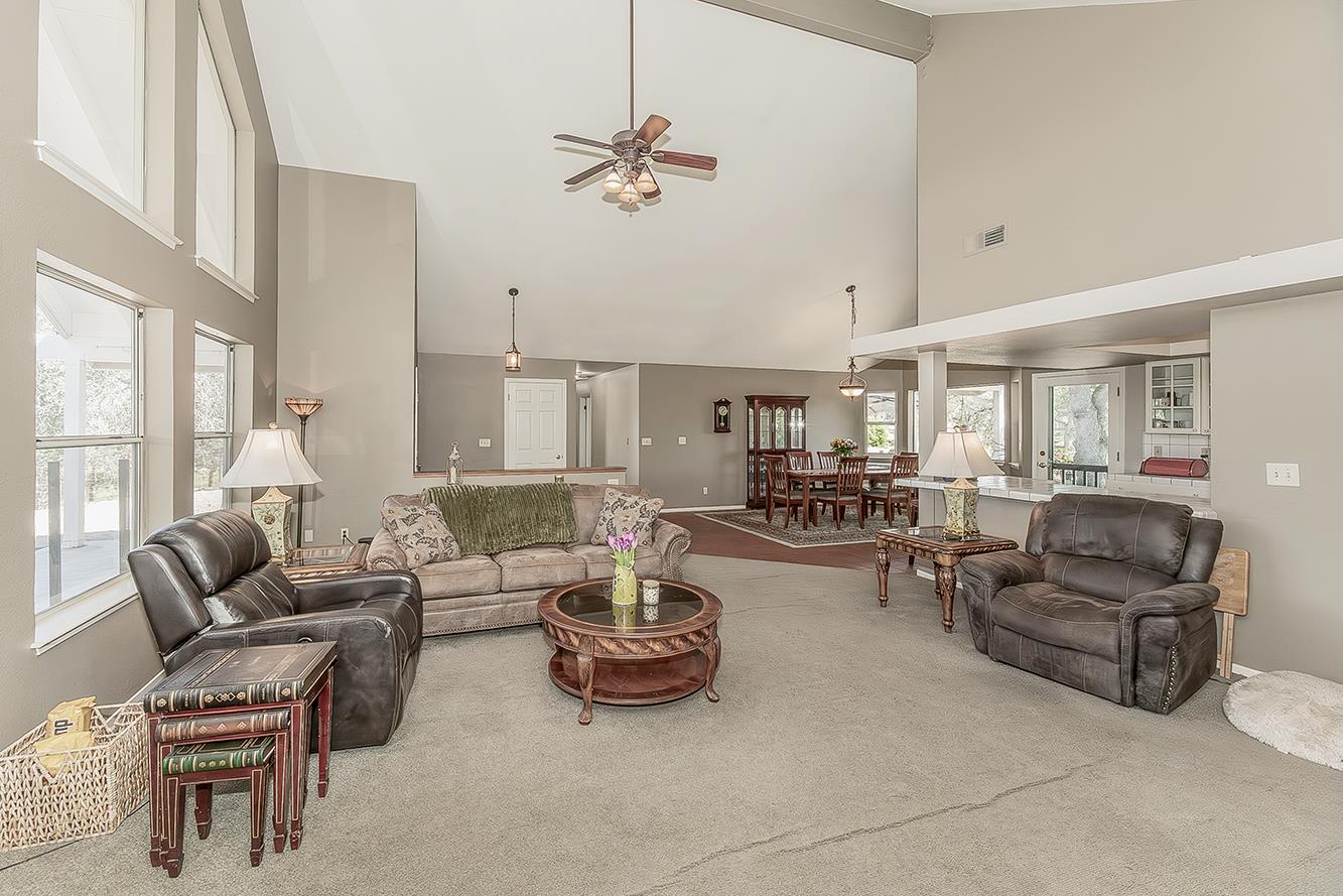 14815 Garlock Lane Prather, CA 93651 - Photo 12 of 80 a living room with furniture and a chandelier