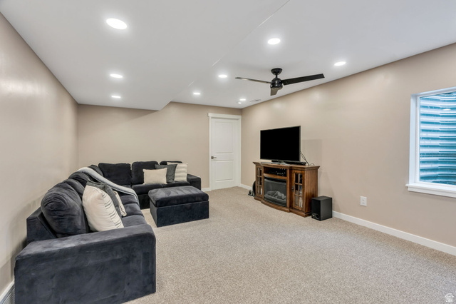 2194 Autumn Drive Mapleton, UT 84664 - Photo 21 of 41 Carpeted living space featuring recessed lighting, a ceiling fan, and a white window with a well guard
