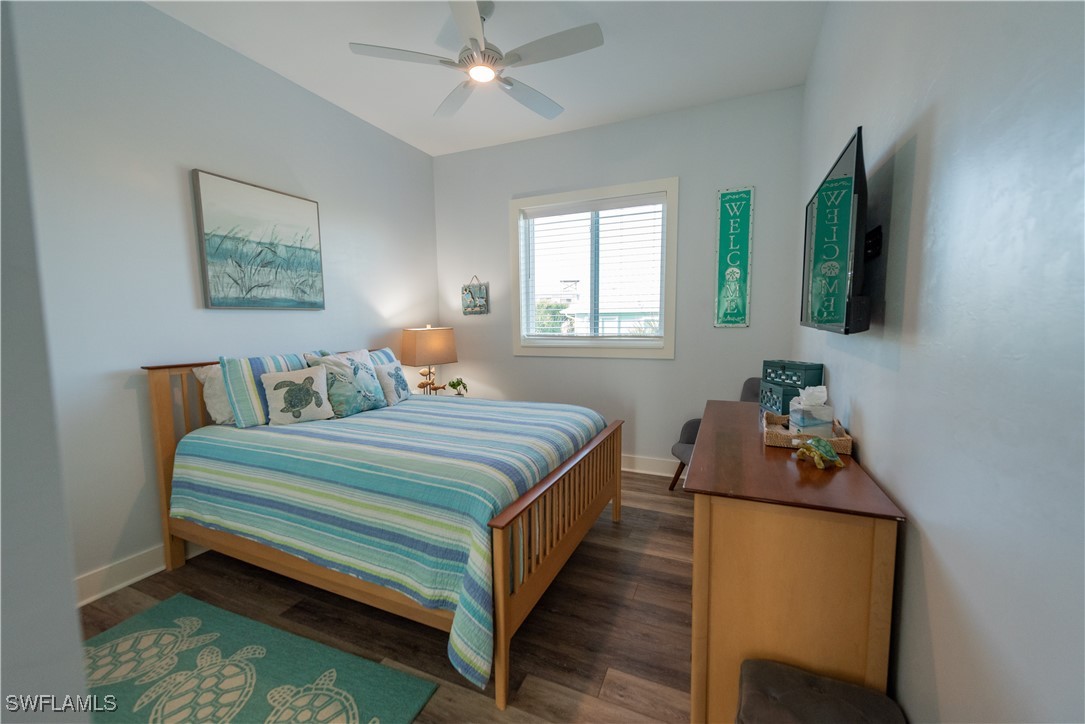 4500 Butterfly Shell Drive Captiva, FL 33924 - Photo 14 of 42 a bedroom with bed tv and window