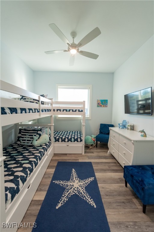 4500 Butterfly Shell Drive Captiva, FL 33924 - Photo 19 of 42 a living room with a rug and a flat screen tv
