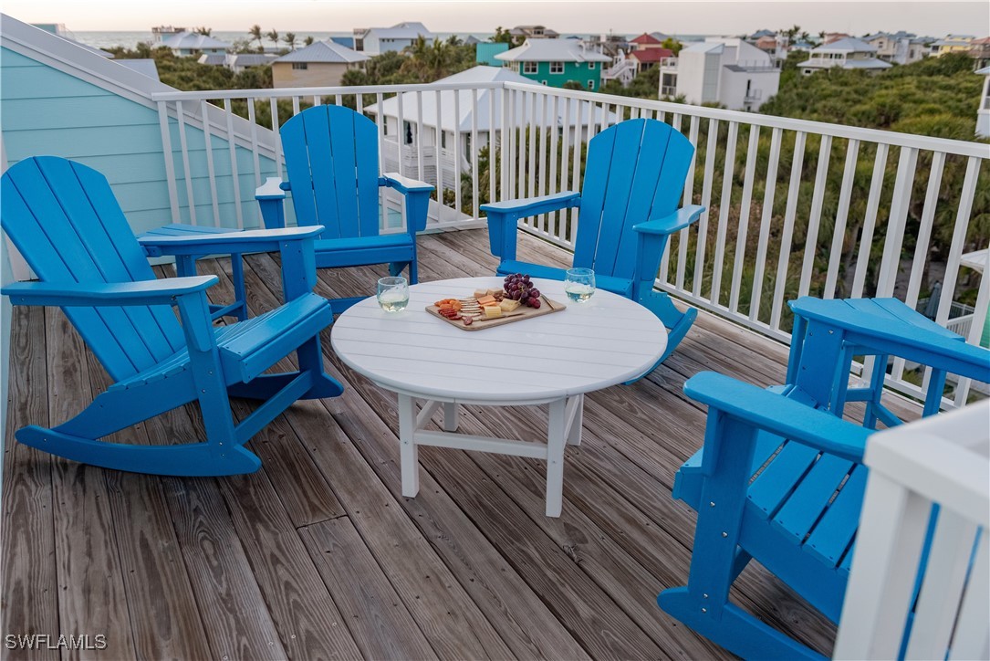 4500 Butterfly Shell Drive Captiva, FL 33924 - Photo 24 of 42 a view of a chairs on the roof deck