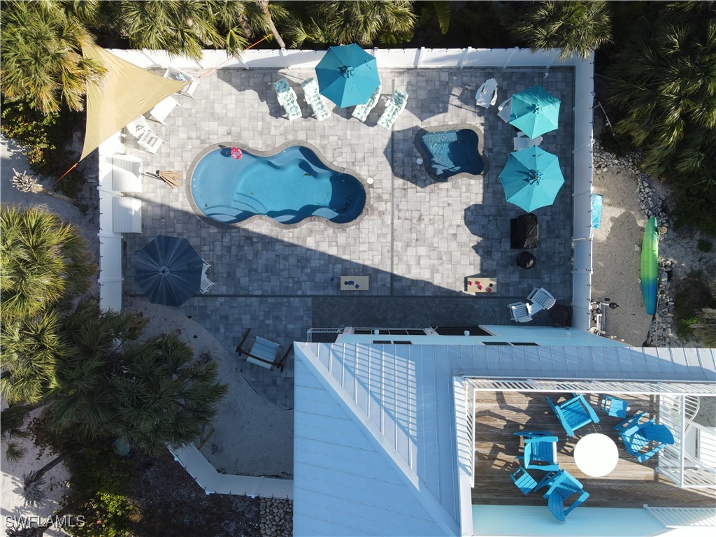 4500 Butterfly Shell Drive Captiva, FL 33924 - Photo 3 of 42 a car parked on the side of the road