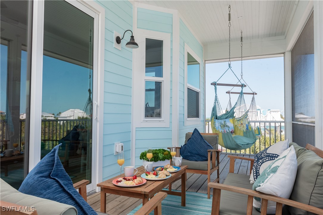 4500 Butterfly Shell Drive Captiva, FL 33924 - Photo 33 of 42 a living room with furniture and a window