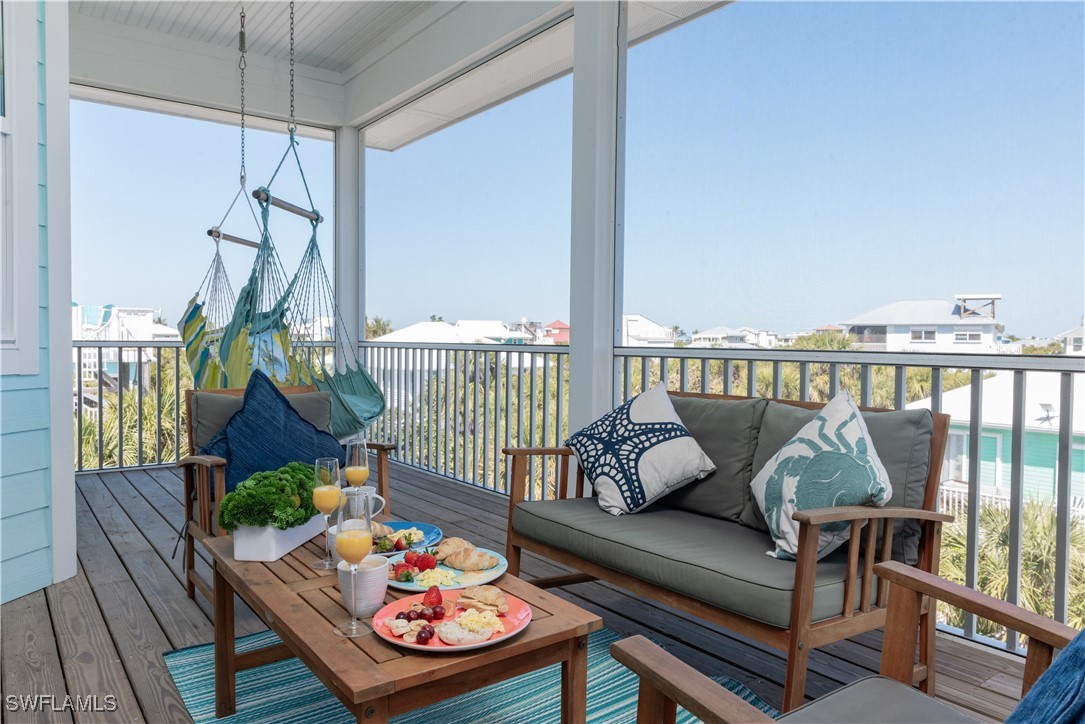 4500 Butterfly Shell Drive Captiva, FL 33924 - Photo 34 of 42 a living room with furniture and wooden floor