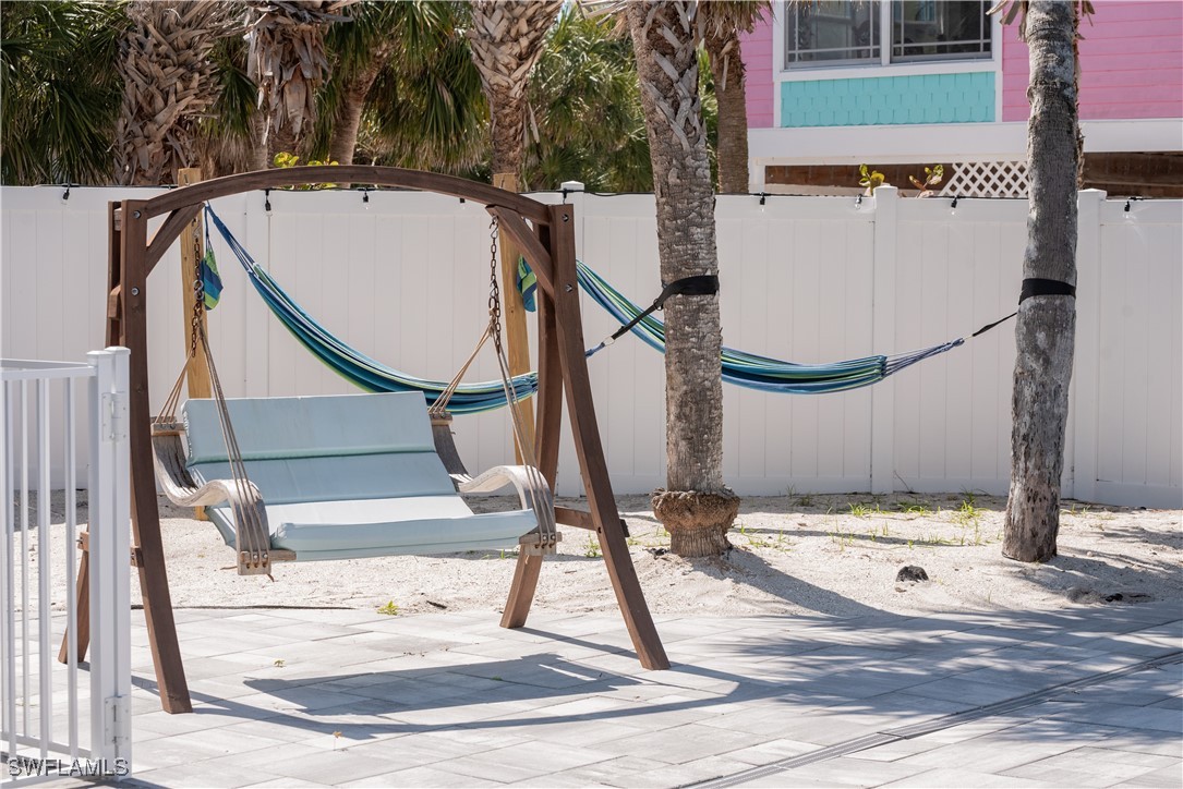 4500 Butterfly Shell Drive Captiva, FL 33924 - Photo 36 of 42 a view of entryway wooden floor and front door