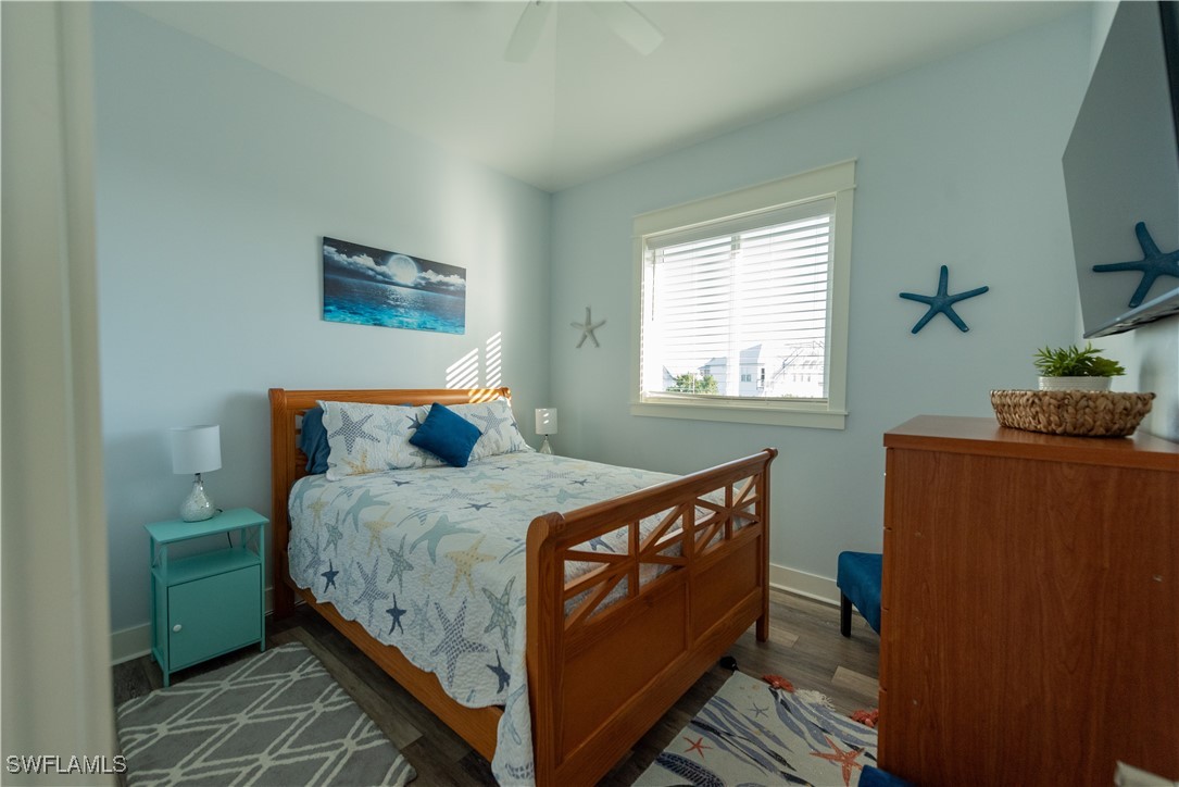 4500 Butterfly Shell Drive Captiva, FL 33924 - Photo 6 of 42 a bed sitting in a bedroom next to a window