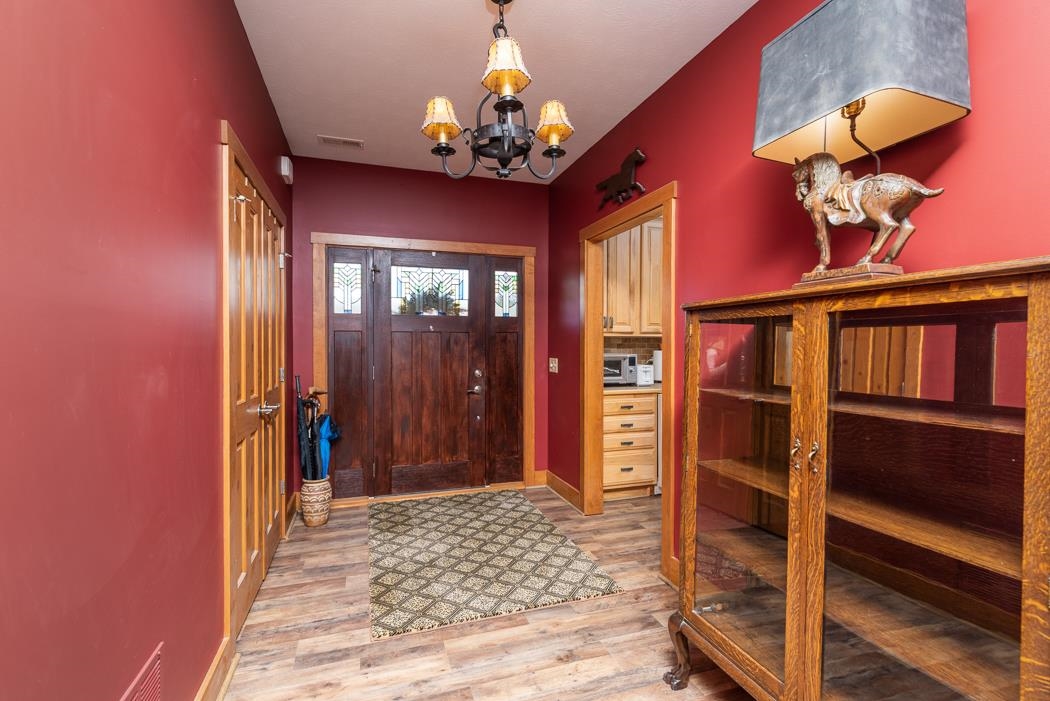 2564 Mt Torrey Road Lyndhurst, VA 22952 - Photo 15 of 64 a view of a hallway with a chandelier and dining room