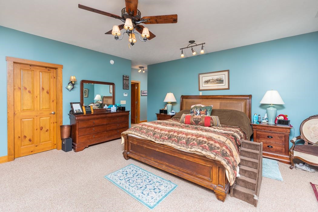 2564 Mt Torrey Road Lyndhurst, VA 22952 - Photo 26 of 64 a bedroom with a bed mirror and a window