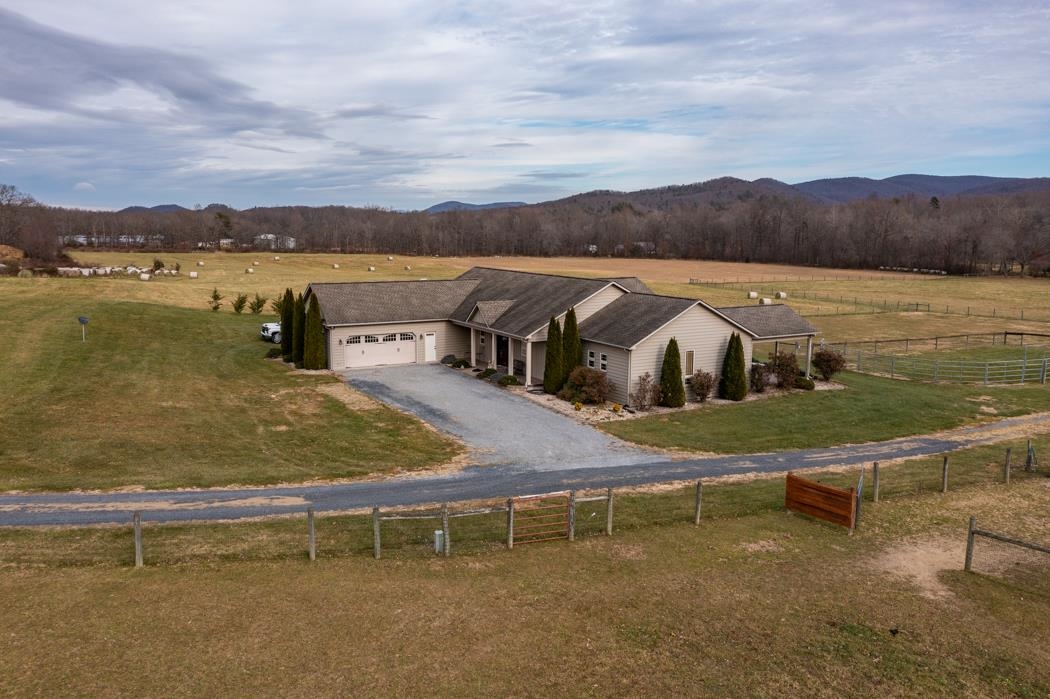 2564 Mt Torrey Road Lyndhurst, VA 22952 - Photo 45 of 64 a view of a lake with houses in the back