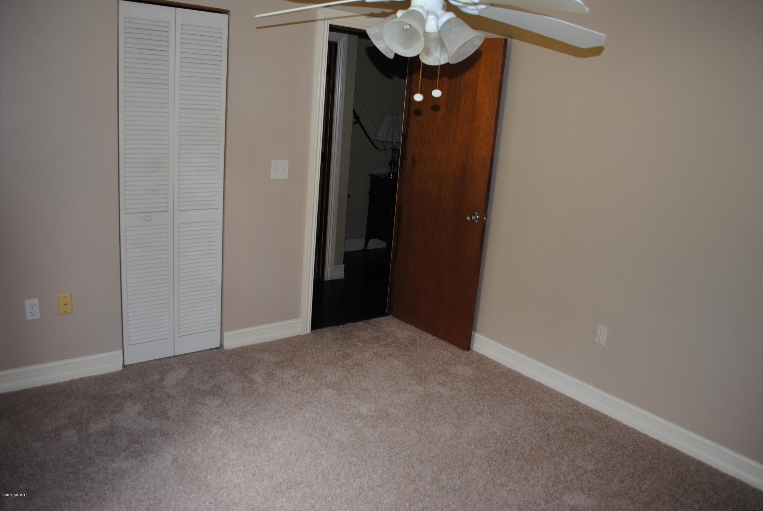 399 Warner Road Southwest Palm Bay, FL 32908 - Photo 15 of 40 a view of an empty room