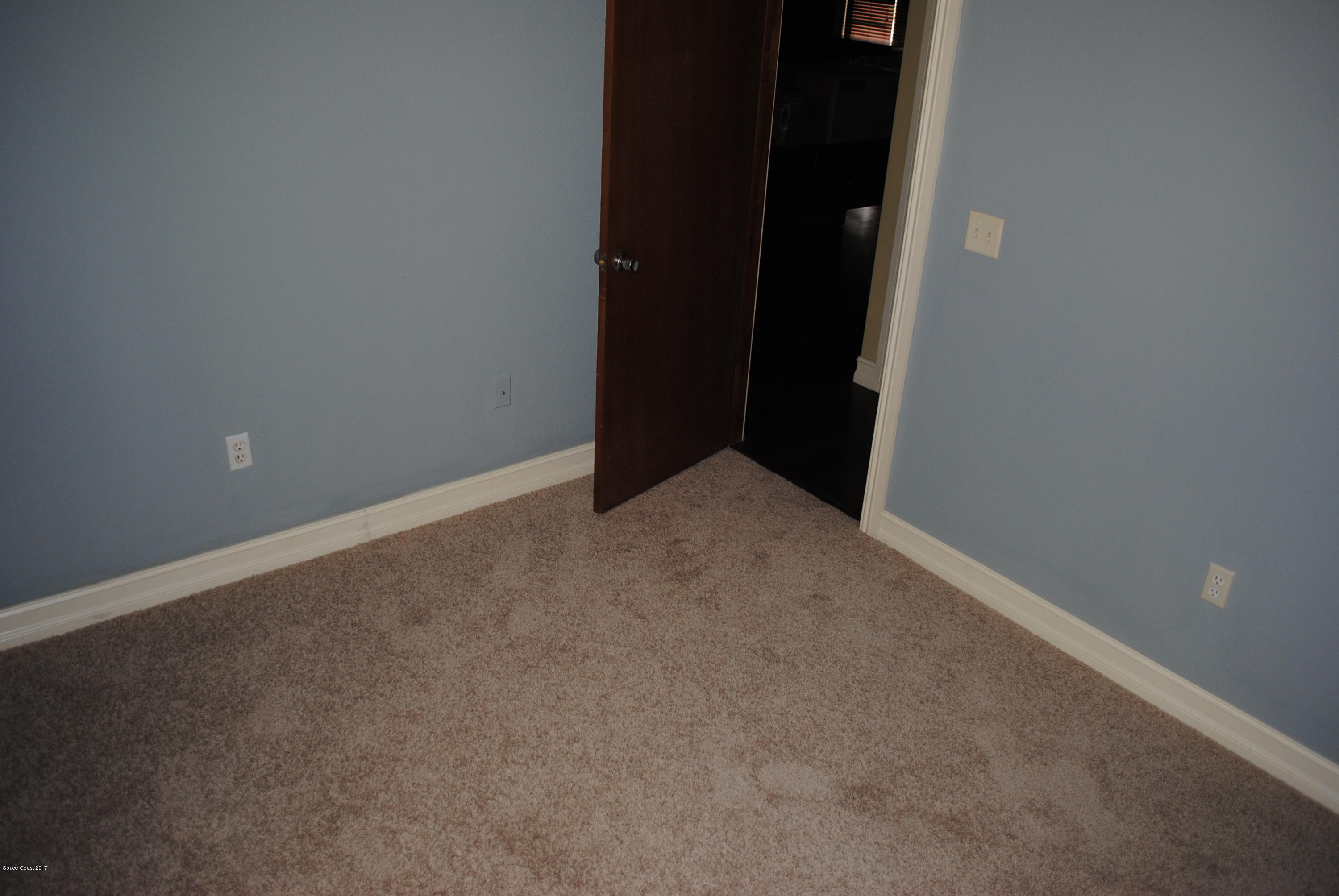 399 Warner Road Southwest Palm Bay, FL 32908 - Photo 19 of 40 a view of an empty room