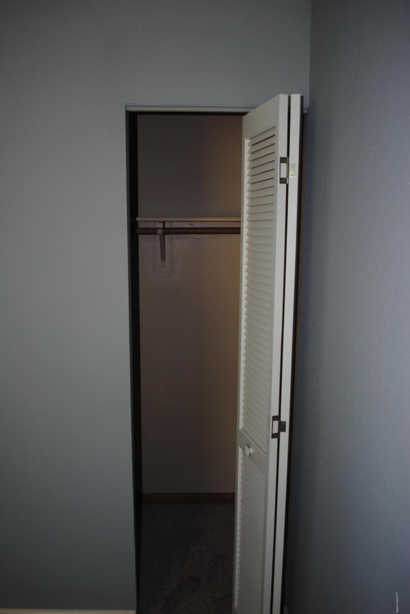 399 Warner Road Southwest Palm Bay, FL 32908 - Photo 21 of 40 a view of closet area