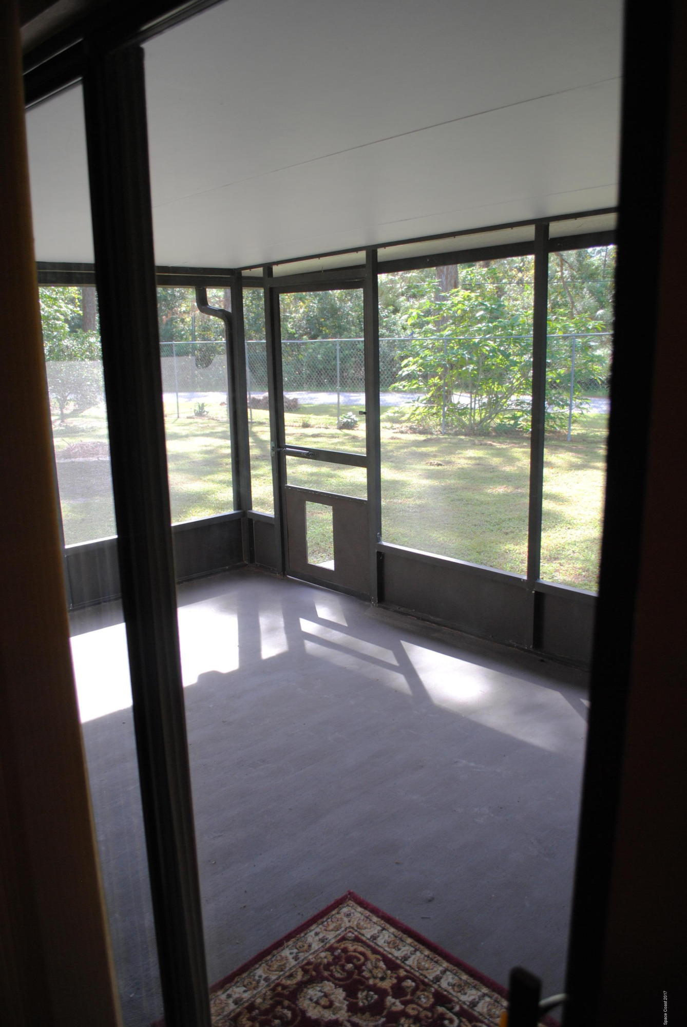 399 Warner Road Southwest Palm Bay, FL 32908 - Photo 32 of 40 a view of an empty room and a window