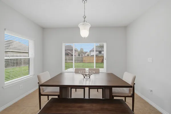 a workspace with furniture and a window