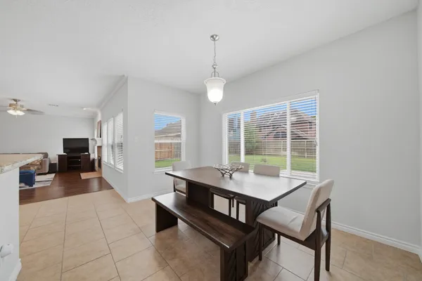 a work room with furniture and window