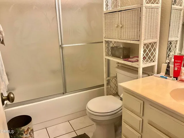 a view of sign board and green field