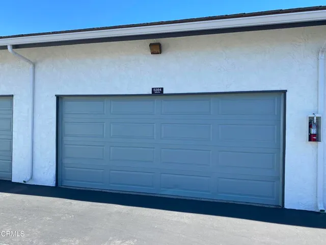 a street sign on a pole on a street