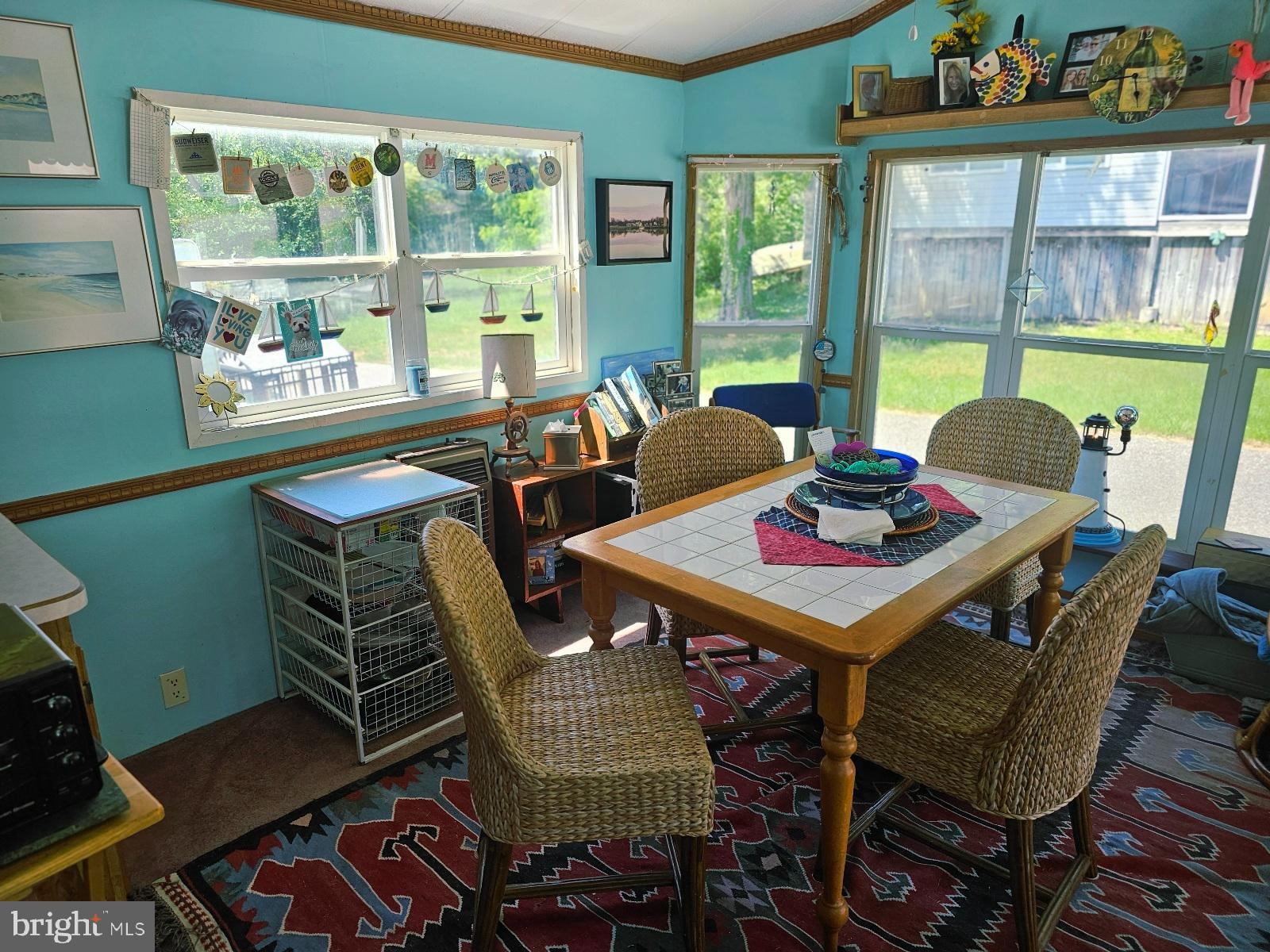 123-124 Palute Circle, Unit GLEN 8 Earleville, MD 21919 - Photo 28 of 40 a dining room with furniture a rug and wooden floor