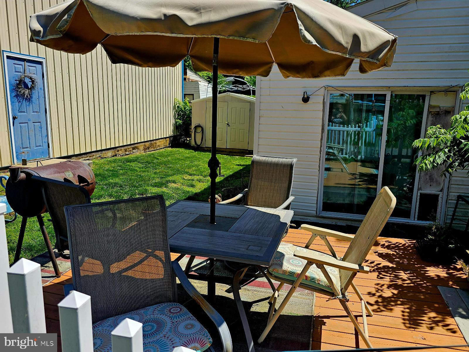 123-124 Palute Circle, Unit GLEN 8 Earleville, MD 21919 - Photo 36 of 40 a view of an outdoor sitting area with brick walls