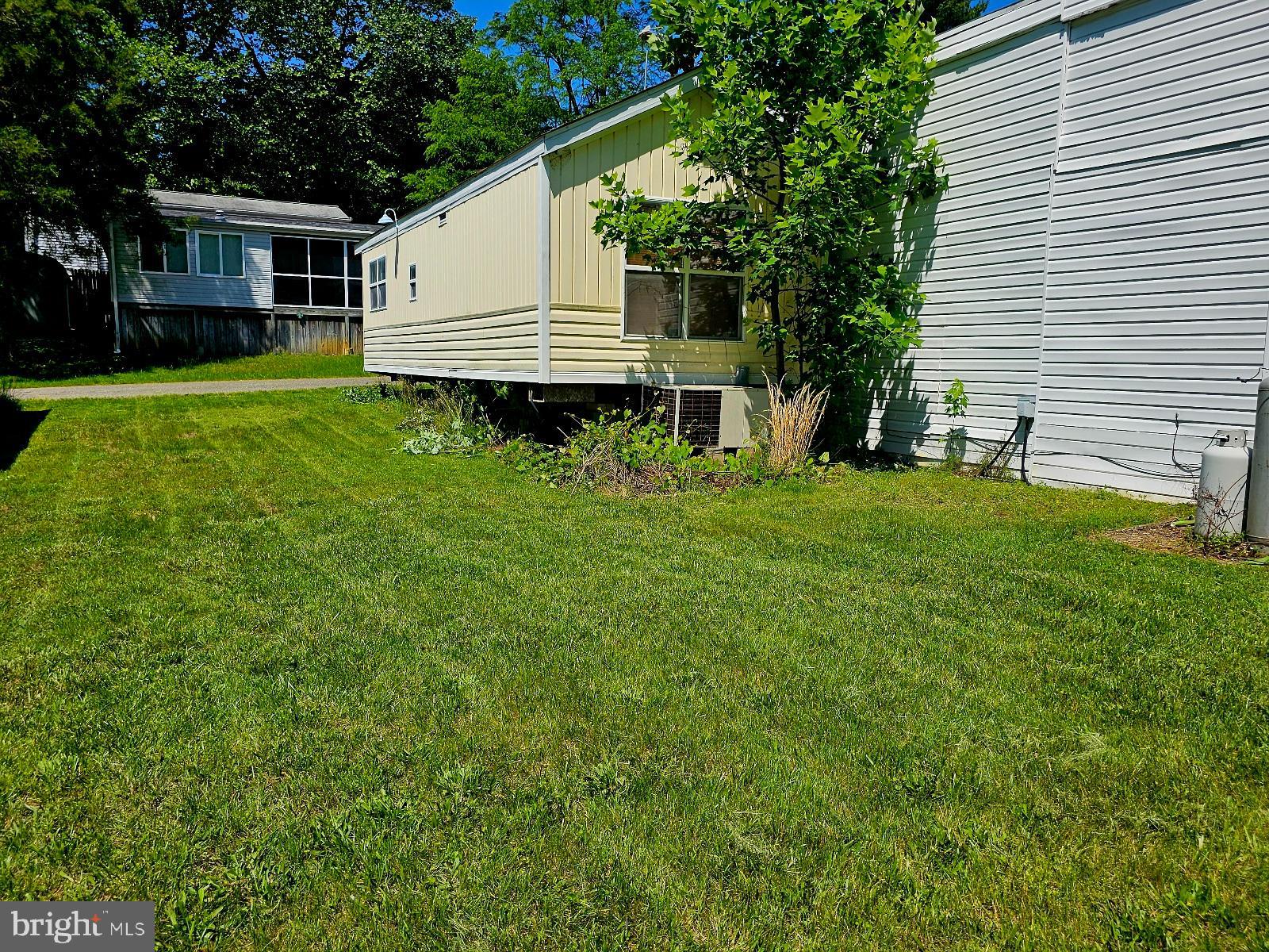 123-124 Palute Circle, Unit GLEN 8 Earleville, MD 21919 - Photo 37 of 40 a view of a house with a backyard