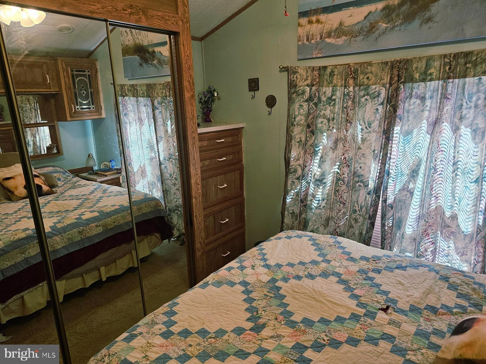 123-124 Palute Circle, Unit GLEN 8 Earleville, MD 21919 - Photo 7 of 40 a bedroom with a bed and a dresser