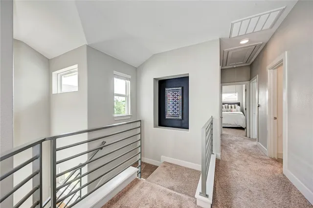 a view of entryway and hall with a window