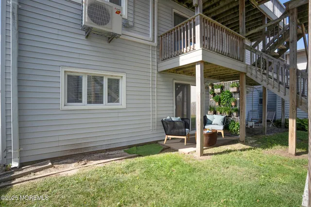 a backyard of a house with seating space