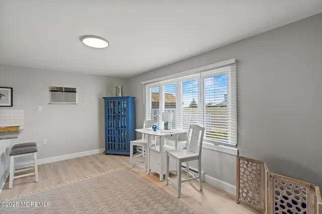 a workspace with furniture and a window