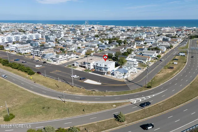 an aerial view of a house with a garden