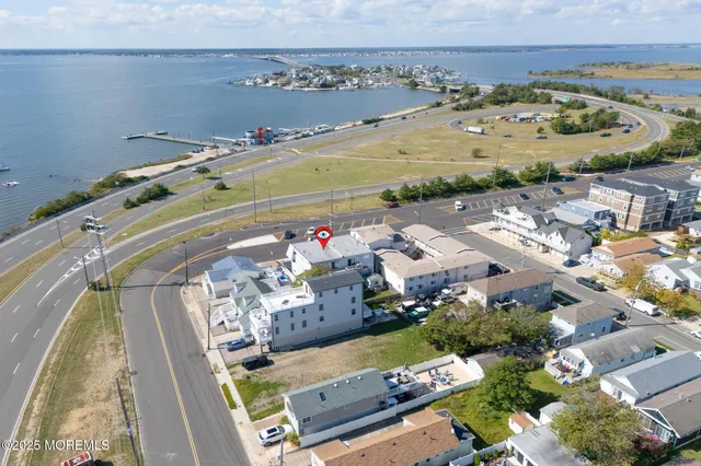 an aerial view of a building with outdoor space