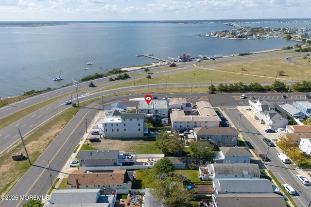 an aerial view of a building with outdoor space