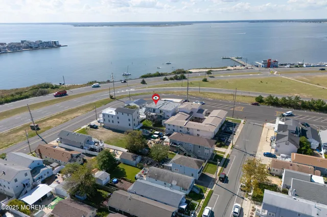 an aerial view of a houses with outdoor space