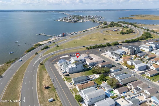 an aerial view of a building with outdoor space