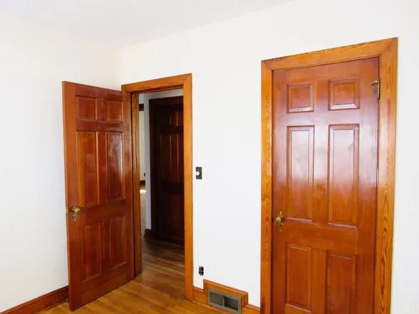 a kitchen with granite countertop stainless steel appliances a refrigerator and a sink